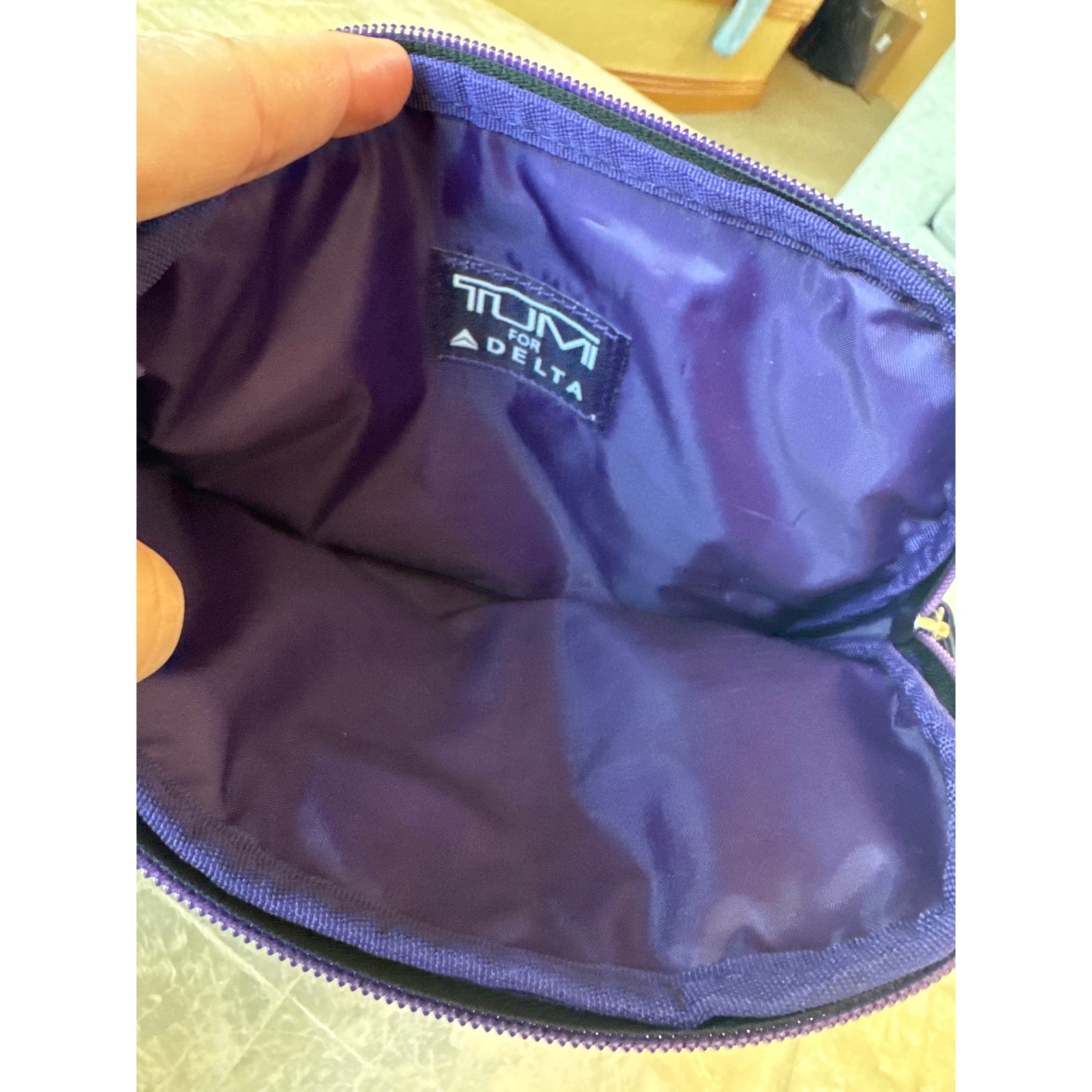 Tumi travel bag black and purple w silver logo zip around toiletry case pouch
