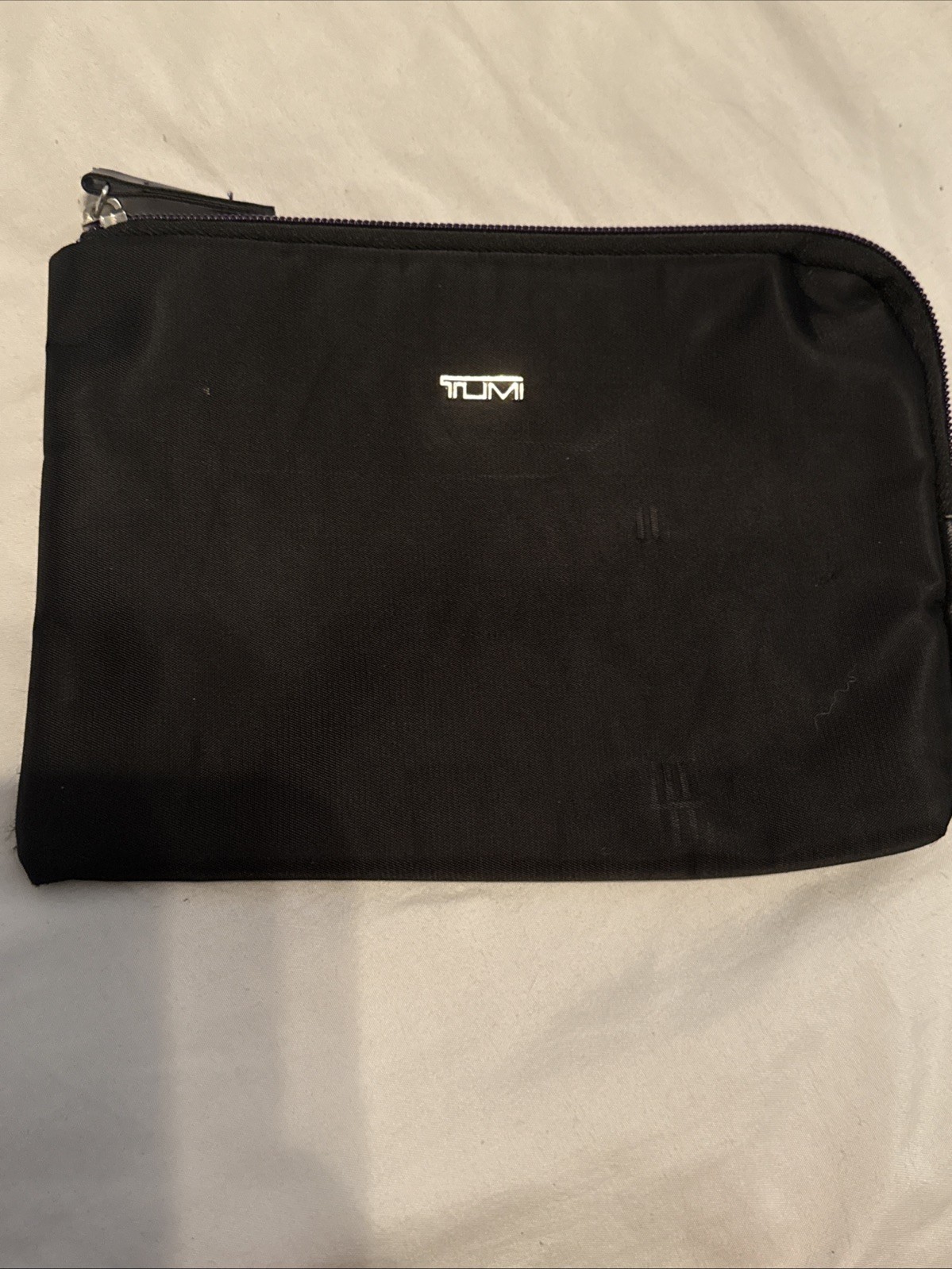 Tumi travel bag black and purple w silver logo zip around toiletry case pouch