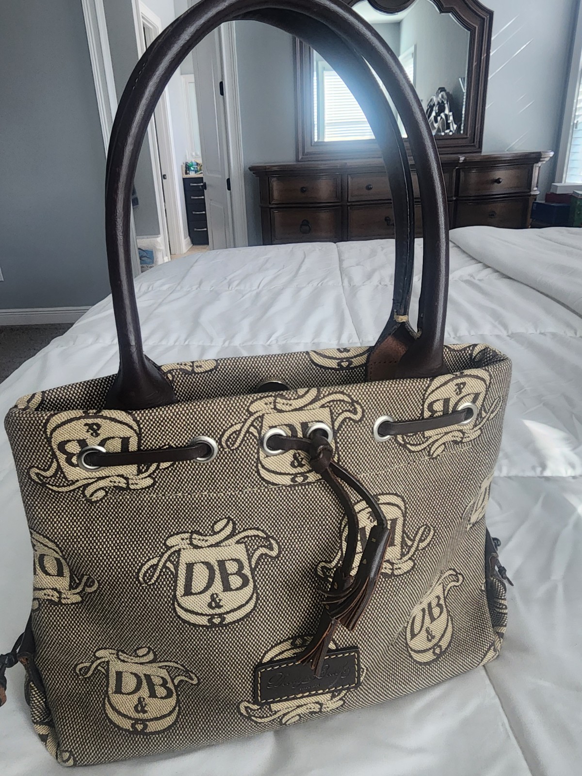 Dooney & Bourke DB Logo Dark Brown Double Handle Mini Tassel