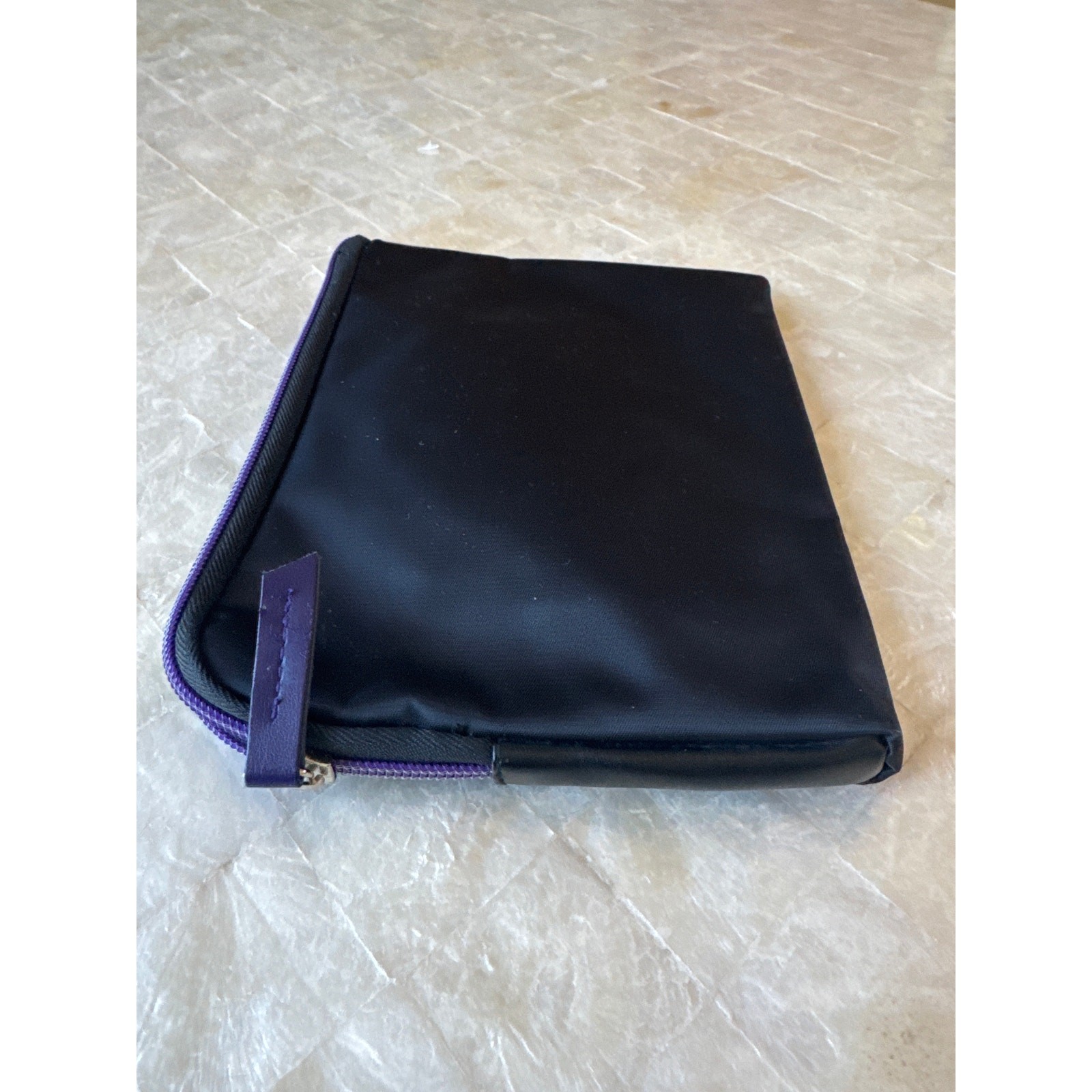Tumi travel bag black and purple w silver logo zip around toiletry case pouch