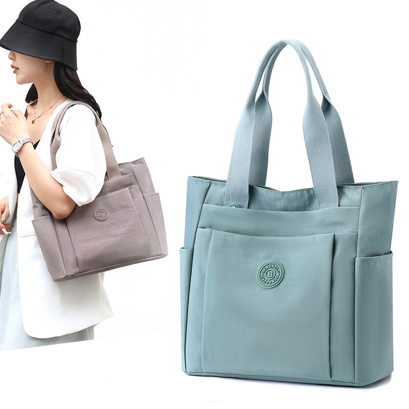 Casual women’s bag casual solid color nylon cloth shoulder portable mother bag