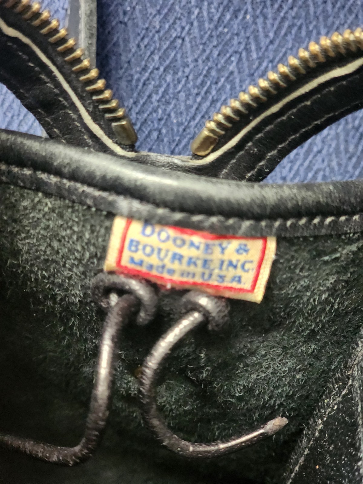 Dooney & Bourke Black Pebbled Satchel Bag with Detachable Strap, Zipper, Logo