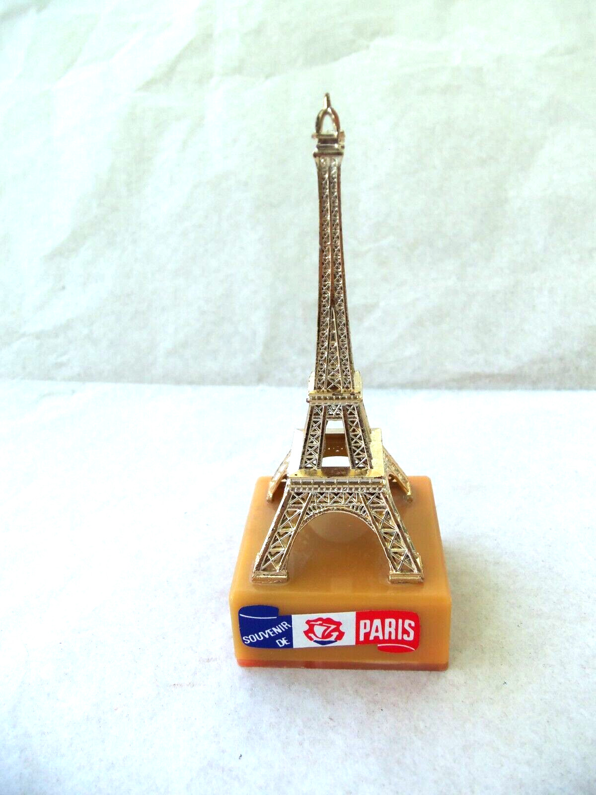 EIFFEL TOWER Souvenir from Paris France! GOLD COLOR PLASTIC! ON BASE! 4 1/4″