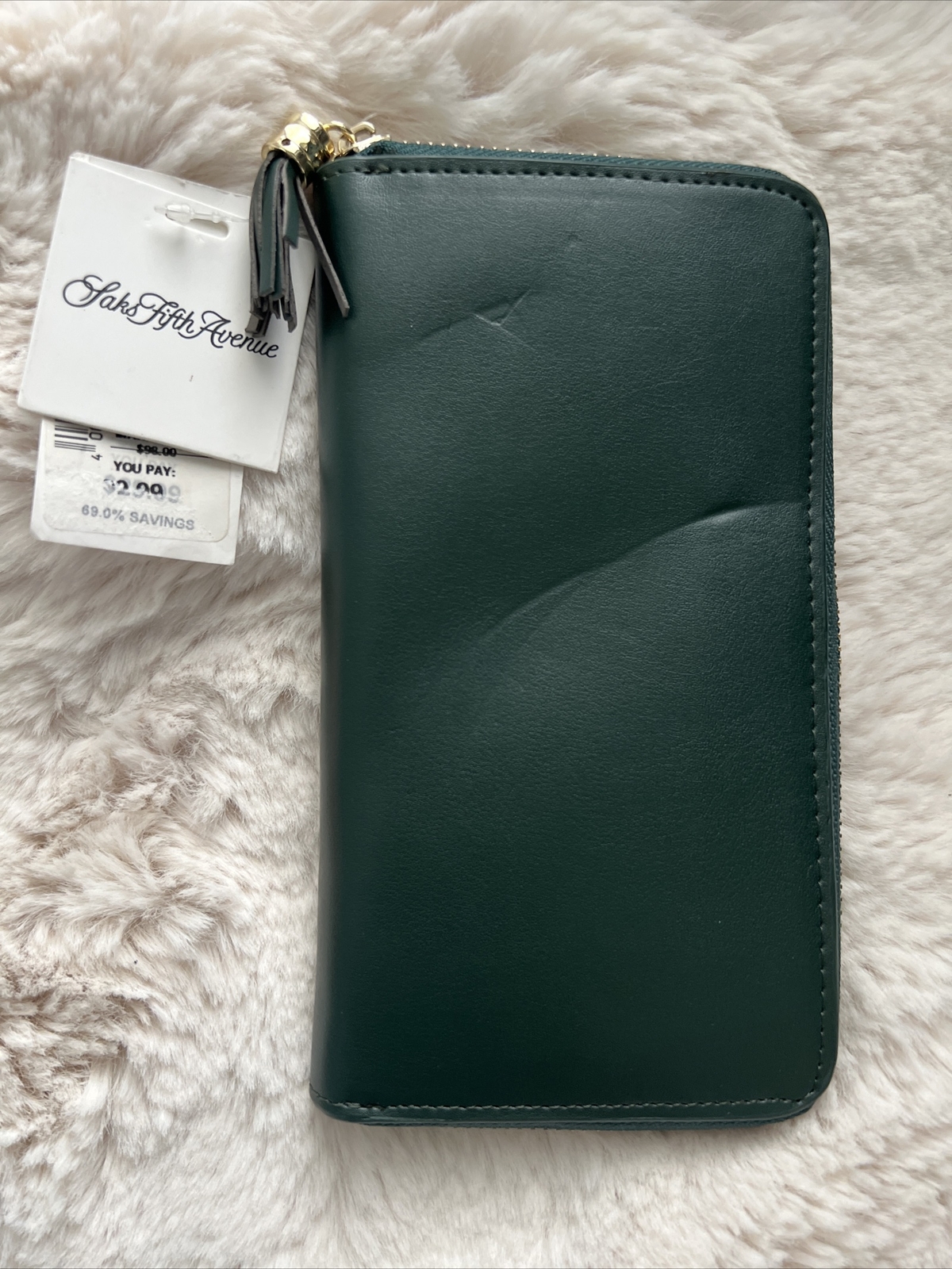 Green modern wallet, with a minor defect