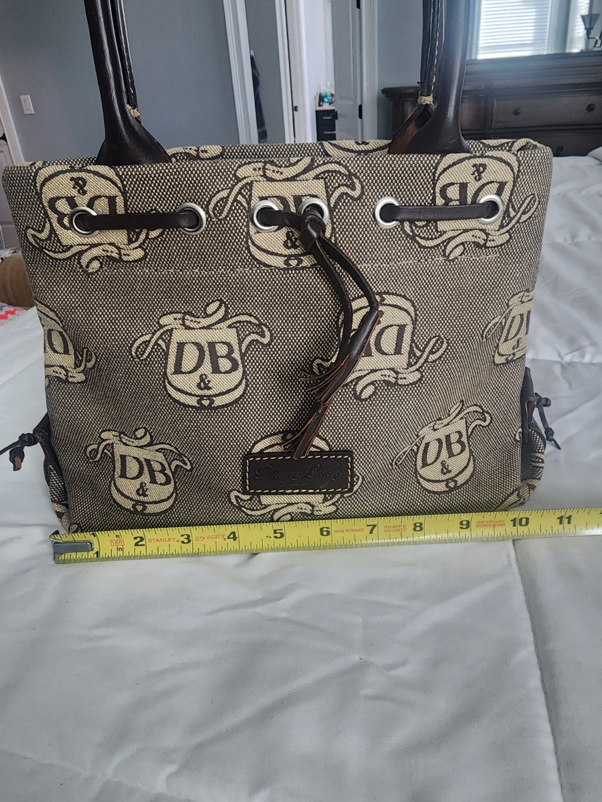 Dooney & Bourke DB Logo Dark Brown Double Handle Mini Tassel